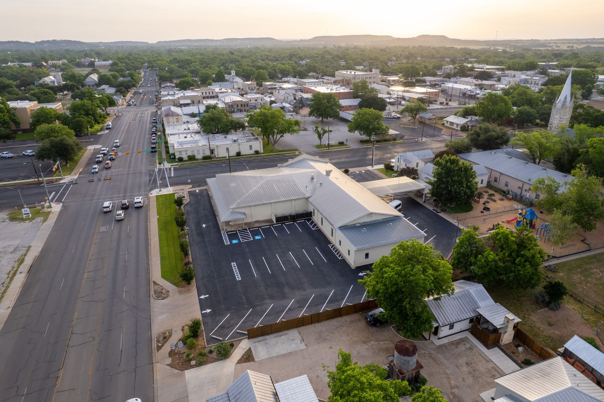 Aerial view of a finished and striped parking area
