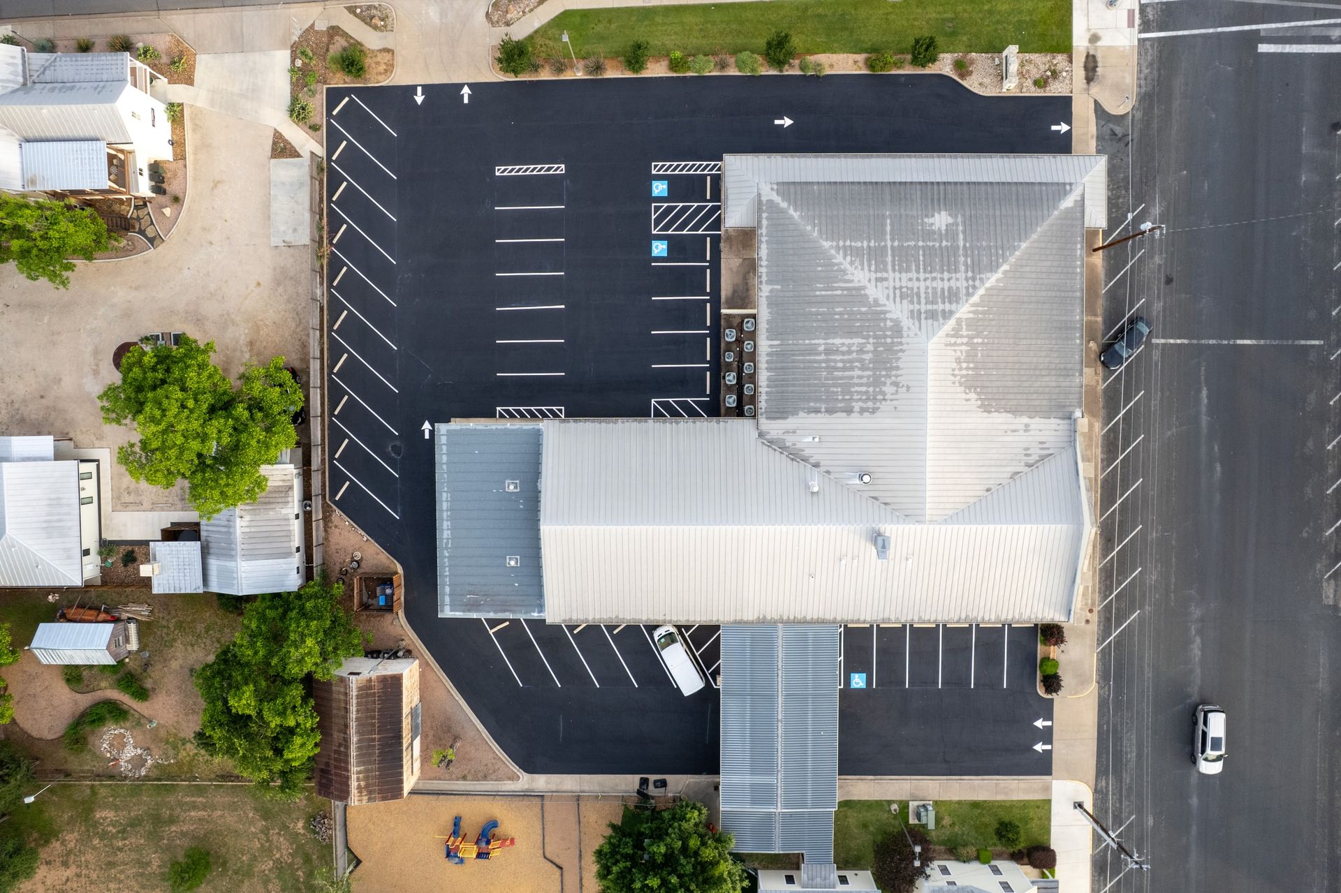Overhead view of a finished and striped parking area